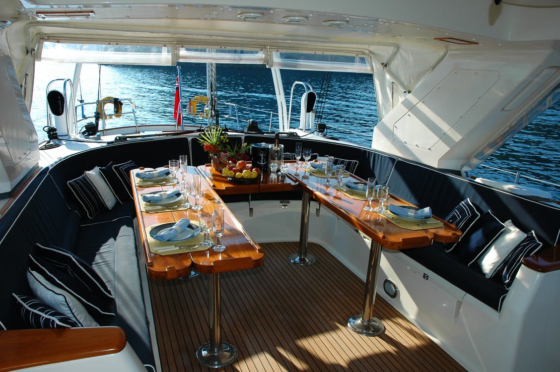 Boat cockpit with a view of the island of Salina